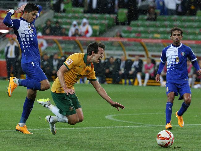 Robbie Kruse wins a penalty for the Socceroos.