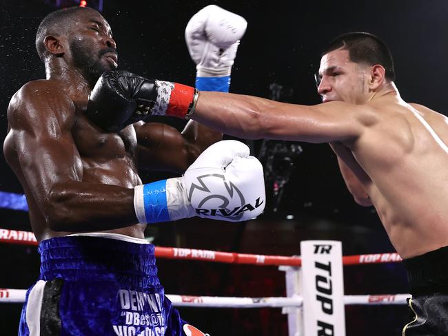 KISSIMMEE, FLORIDA - APRIL 24: Edgar Berlanga and Demond Nicholson exchange punches during their fight at the Silver Spurs Arena on April 24, 2021 in Kissimmee, Florida. (Photo by Mikey Williams/Top Rank Inc via Getty Images)