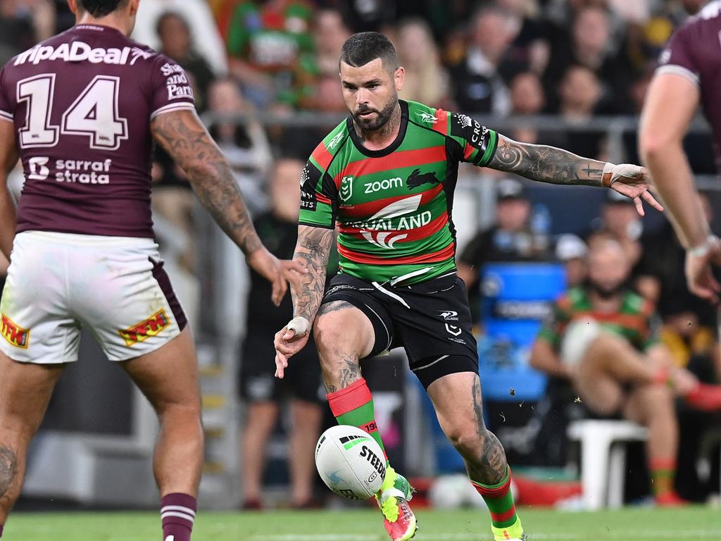BRISBANE, AUSTRALIA - SEPTEMBER 24:  Adam Reynolds of the Rabbitohs kicks the ball during the NRL Preliminary Final match between the South Sydney Rabbitohs and the Manly Sea Eagles at Suncorp Stadium on September 24, 2021 in Brisbane, Australia. (Photo by Bradley Kanaris/Getty Images)