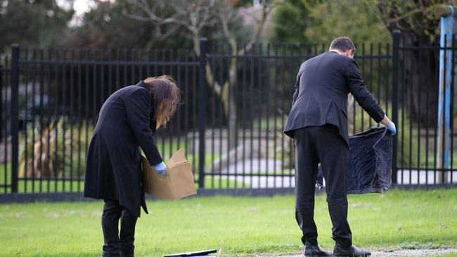 Police investigating the circumstances surrounding the death of a man in Endeavour Hills and scour the surrounding area. Picture: Sarah Matray