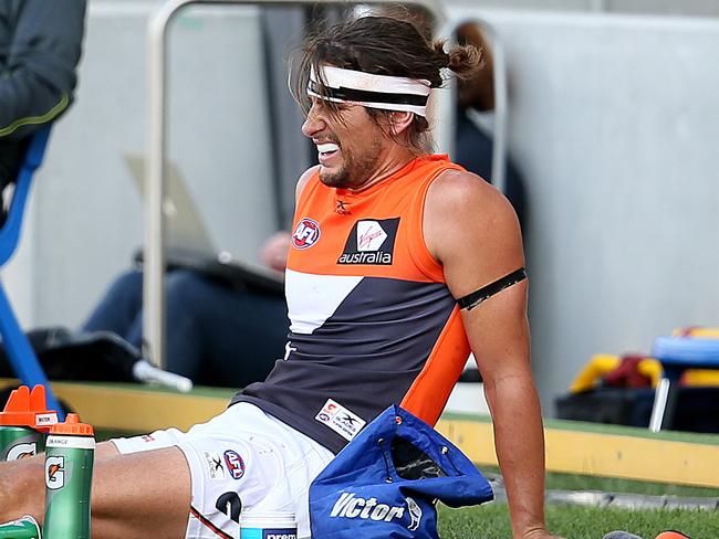 North Melbourne versus GWS at Blundstone Arena. GWS' Ryan Griffen gets his ankle looked at. Picture: SAM ROSEWARNE.