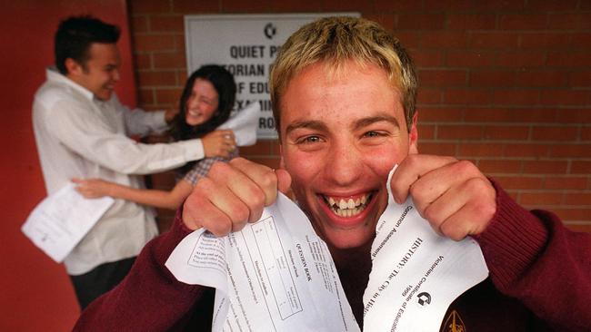 Last VCE exams for the year at Koonung Secondary College, Box Hill, in 1992. Ben tears up his last exam paper while Josh and Emma celebrate in the background.