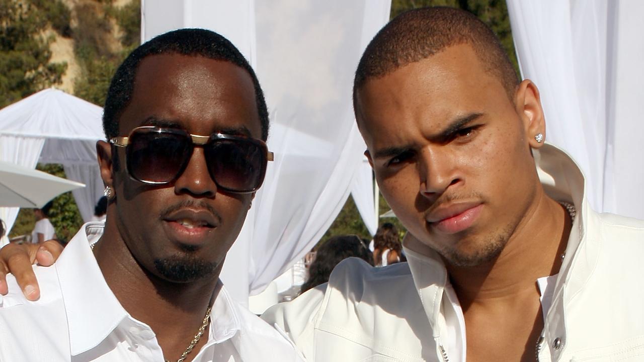 Diddy (left) with fellow R&amp;B star Chris Brown in 2009. Diddy was famed for his lavish celeb parties. Picture: Jason Merritt/Getty Images/Getty