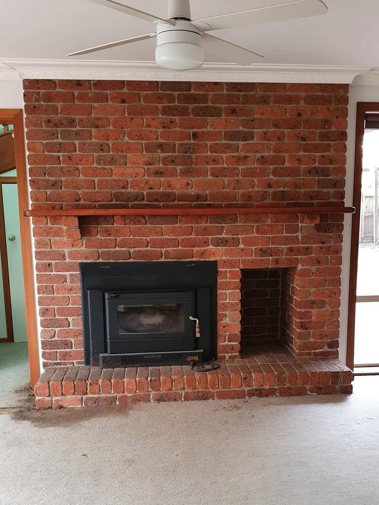 Ms Kumnick-Diaz says the brick fireplace was one of the features that drew them to the home, however they wanted to refresh the colour scheme. Picture: Supplied.