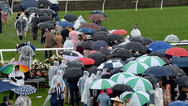 It was a wet start to the Melbourne Cup. Picture: Nicole Garmston