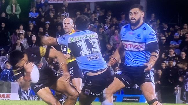 Cronulla’s Dale Finucane swings and connects with Penrith’s Stephen Crichton at BlueBet Stadium on Saturday night. Supplied