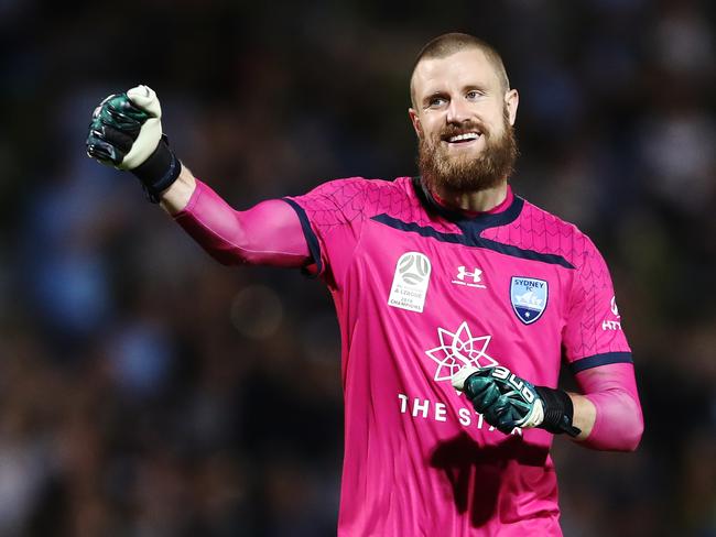SYDNEY, AUSTRALIA - DECEMBER 07: Andrew Redmayne of Sydney celebrates team mate Adam Le Fondre  scoring a goal during the round nine A-League match between Sydney FC and the Brisbane Roar at Netstrata Jubilee Stadium on December 07, 2019 in Sydney, Australia. (Photo by Brendon Thorne/Getty Images)
