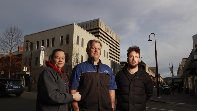 Heidi and Robert McIntyre owners of Autocraft with Michael Johnstone of The Tasmanian Wine Centre. Collins Street businesses who are unhappy about the proposed changes to parking on the street. Picture: Nikki Davis-Jones