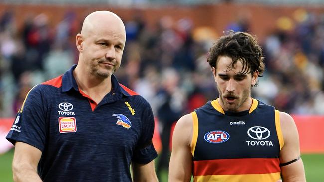 ADELAIDE, AUSTRALIA - JULY 01: Lachlan Murphy of the Crows speaks to Matthew Nicks coach of the Crows after the round 16 AFL match between Adelaide Crows and Melbourne Demons at Adelaide Oval, on July 01, 2023, in Adelaide, Australia. (Photo by Mark Brake/Getty Images)