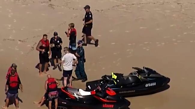 Emergency services on the scene of a jet ski accident near South Stradbroke Island that left a man dead. Picture: 7 News Queensland