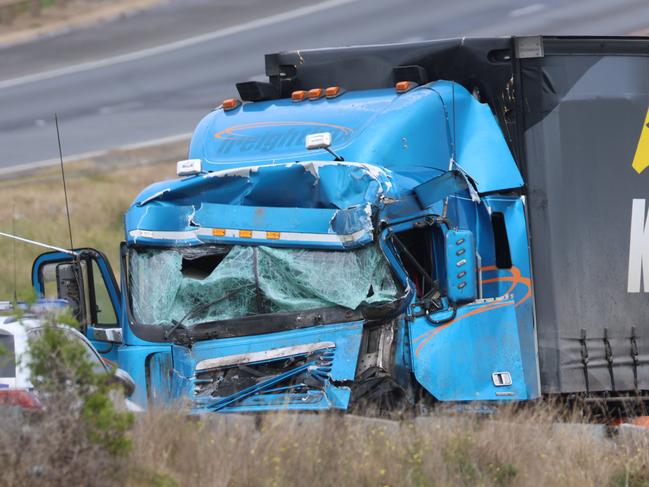 Mr Russell’s prime mover was seen “weaving” through traffic management on the Western Freeway before it “swerved back” and hit the rear of the school bus. Picture: Brendan Beckett