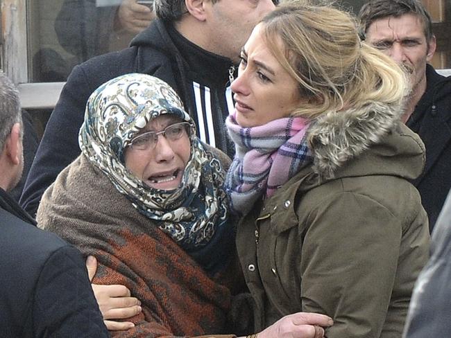 Family members of victims of an overnight attack at a nightclub, cry outside the Forensic Medical Center in Istanbul. Picture: AP