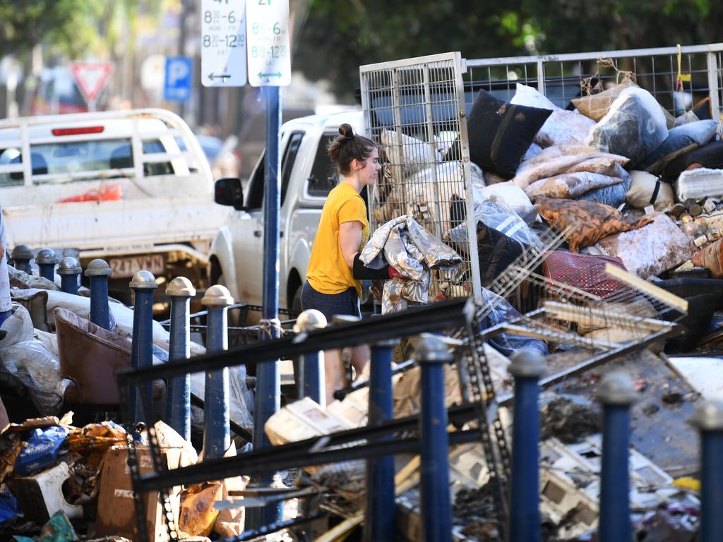 Piles of destroyed goods line flood-affected Lismore on Wednesday. Photo: Dan Peled/Getty Images