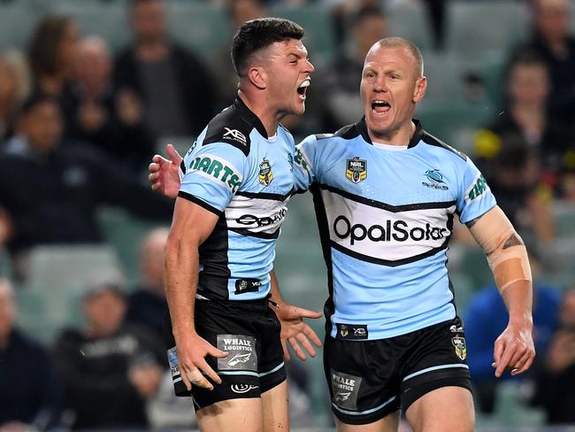 Luke Lewis (R) celebrates with teammate Chad Townsend. Picture: AAP