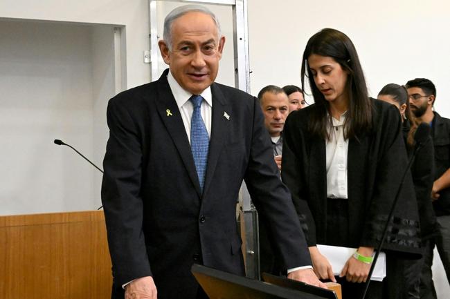 Israeli Prime Minister Benjamin Netanyahu attends the fifth day of testimony in his trial on corruption charges at the district court in Tel Aviv