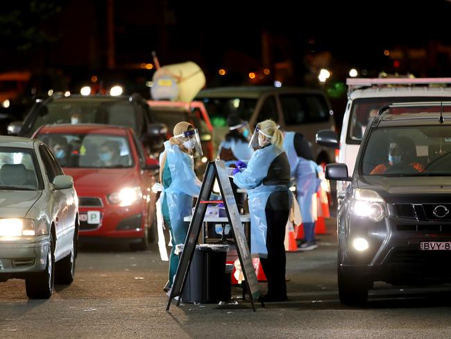 Long lines of cars queue up at the Merrylands Covid testing site in NSW. Picture: Toby Zerna