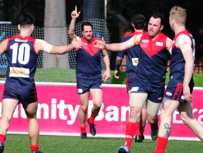 Tullamarine celebrates a goal during Sunday’s win. Picture: Jamie Morey