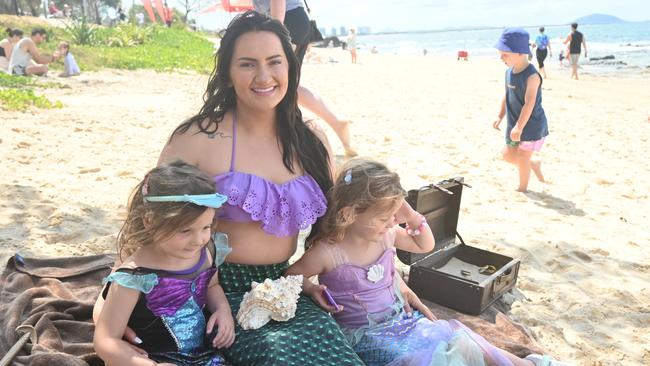 Sophie, 3 and Madeline Paton 3 with Mermaid Kalessi from Mermaid Connection at the Mooloolaba Foreshore Festival. Picture: Tegan Annett