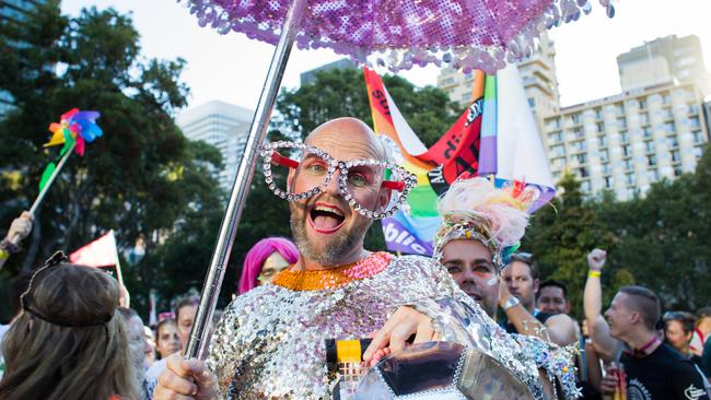 A parade entrant poses for the camera in the marshalling area in Hyde Park at the 2016 Sydney Gay & Lesbian Mardi Gras.