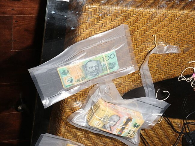 $65,000 was also recovered in the police raid. Picture: Queensland Police Service