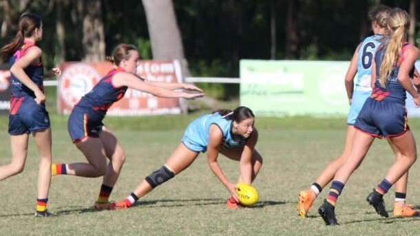 The silky hands of Taya North at ground level playing for Wynnum.