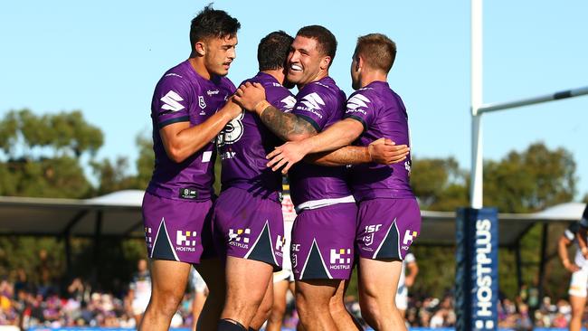 Dale Finucane (2l) of the Storm celebrates afrer scoring a try during the NRL Trial match between the Melbourne Storm and the North Queensland Cowboys at Casey Fields on February 29. Picture: Getty Images