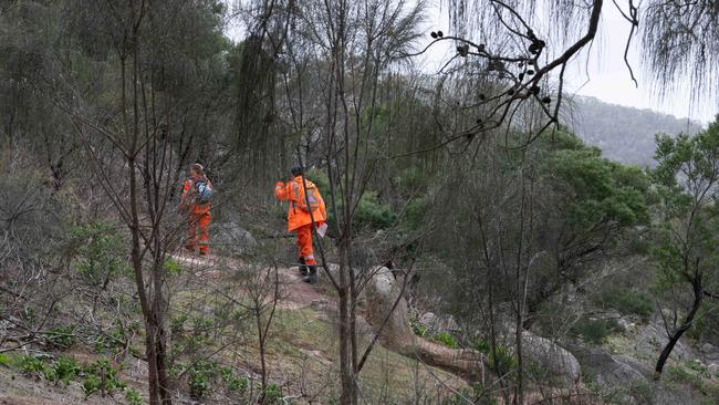 SES focus on a trail in the search for a missing man Darren Blake at the You Yangs. Picture: Brad Fleet