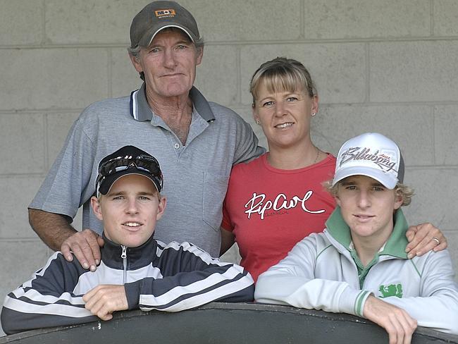 Identical 16-year-old twins Tommy (left) and Nathan with parents Kevin and Julie Berry. 