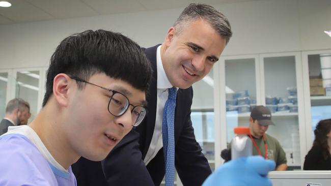 Premier Peter Malinauskas, talks to Uni SA PHD student Casper Liu, while on a visit to Uni SA’s Bradley Lab. Picture: NCA NewsWire / Dean Martin