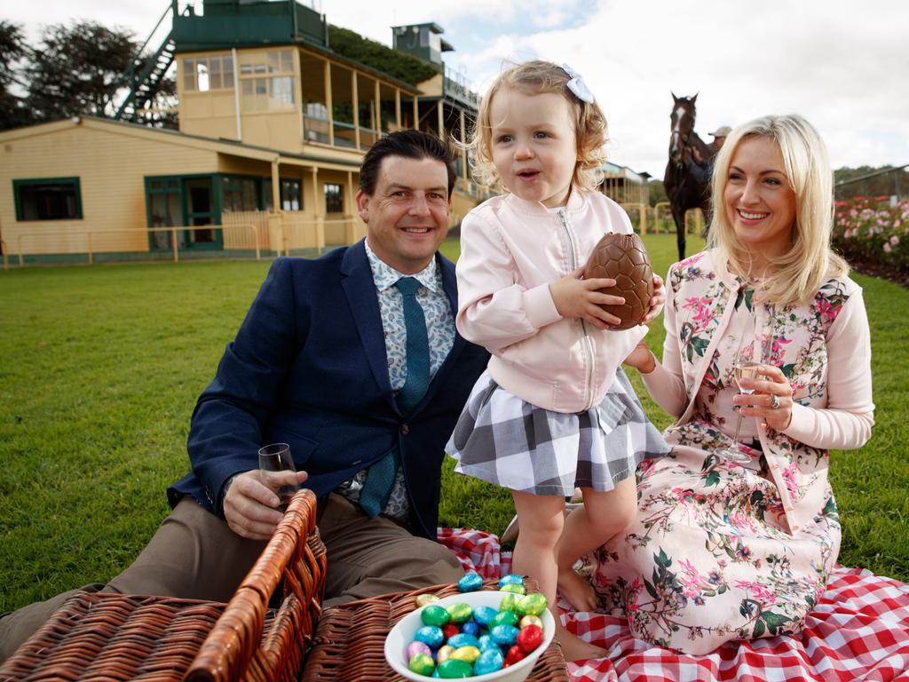 A Total Fire Ban means barbecues are out at Oakbank on Easter Saturday. Amy and Luke Rowley with their daughter Harriet 2 and Barry Brook in background with his Searaven.