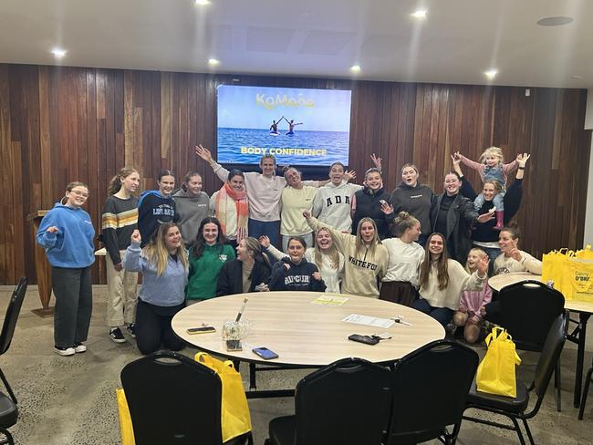 Ironwomen Harriet Brown and Lizzie Welborn with junior female athletes at a session they conducted for KaMana. Picture: Supplied.