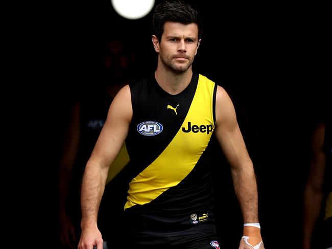 SYDNEY, AUSTRALIA - MAY 30: Trent Cotchin of the Tigers leads his team onto the field during the round 11 AFL match between the Richmond Tigers and the Adelaide Crows at GIANTS Stadium on May 30, 2021 in Sydney, Australia. (Photo by Brendon Thorne/Getty Images)