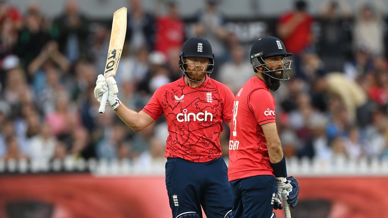 England batsman Jonny Bairstow reaches his 50 as Moeen Ali looks on. (Photo by Stu Forster/Getty Images)