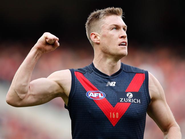 MELBOURNE, AUSTRALIA - AUGUST 26: Tom McDonald of the Demons celebrates a goal during the 2018 AFL round 23 match between the Melbourne Demons and the GWS Giants at The Melbourne Cricket Ground on August 26, 2018 in Melbourne, Australia. (Photo by Adam Trafford/AFL Media/Getty Images)