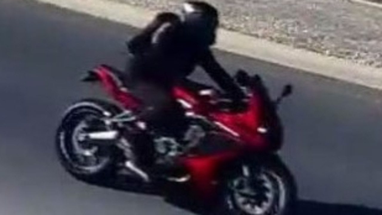 Cops hunt ‘red rider’ after fatal crash