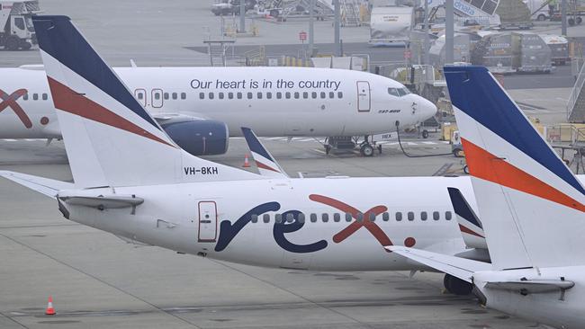 Boeing 737 planes owned by Rex Airlines lay idle on the tarmac at Melbourne's Tullamarine Airport after the regional carrier went into voluntary administration. Picture: AFP