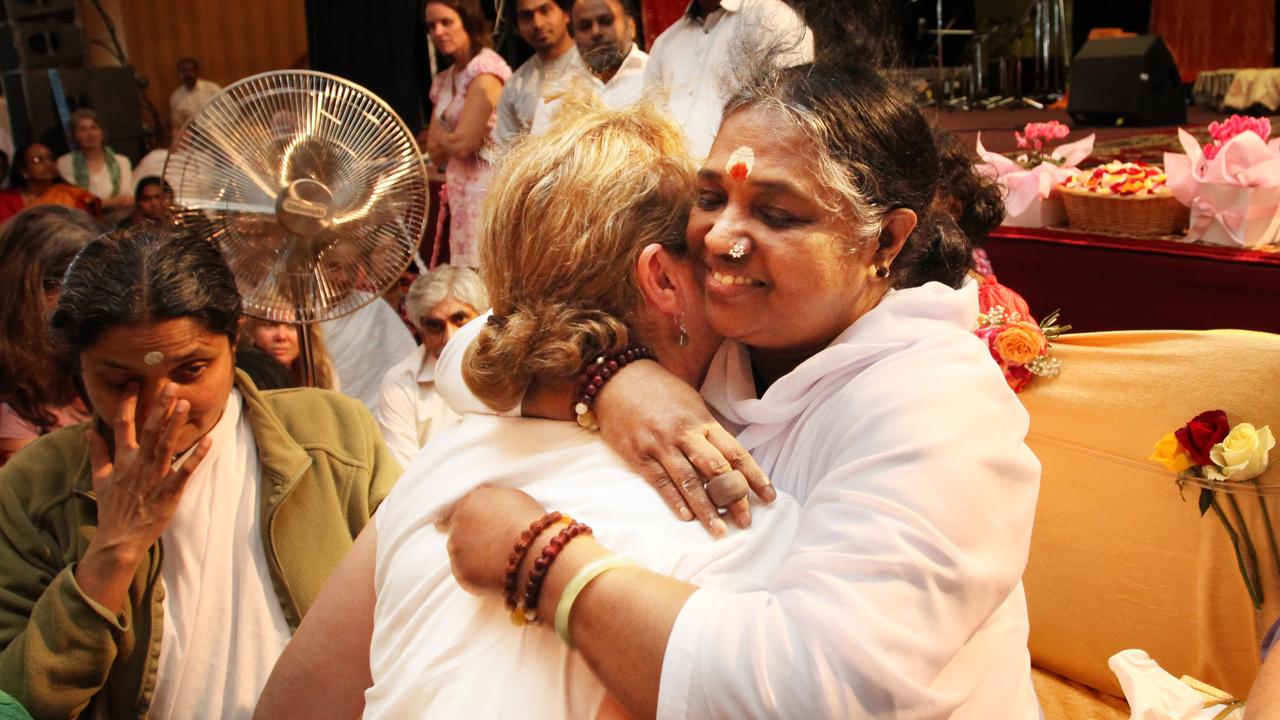 Free hugs  Amma the    hugging saint    embrace thousands followers