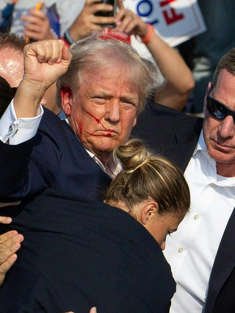 Donald Trump moments after the campaign rally shooting. Picture: AFP