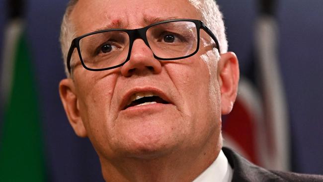 (FILES) Australia's former prime minister Scott Morrison speaks to media during a press conference in Sydney on August 17, 2022. (Photo by Steven Saphore / AFP)