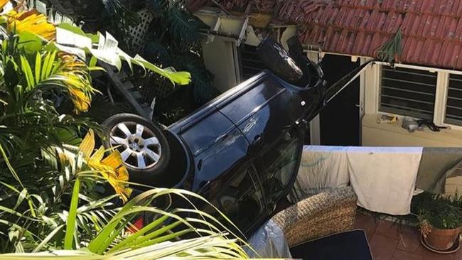 The car that fell on to a house in Lawson Place at Manly. Photo: Matt Harris (Instagram)