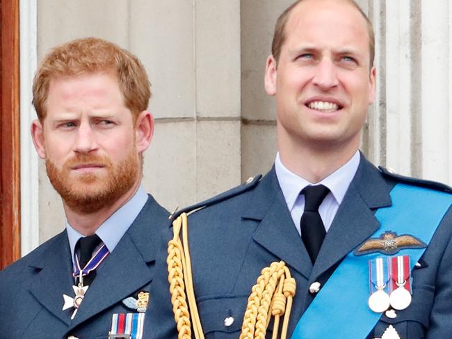 LONDON, UNITED KINGDOM - JULY 10: (EMBARGOED FOR PUBLICATION IN UK NEWSPAPERS UNTIL 24 HOURS AFTER CREATE DATE AND TIME) Prince Harry, Duke of Sussex and Prince William, Duke of Cambridge watch a flypast to mark the centenary of the Royal Air Force from the balcony of Buckingham Palace on July 10, 2018 in London, England. The 100th birthday of the RAF, which was founded on on 1 April 1918, was marked with a centenary parade with the presentation of a new Queen's Colour and flypast of 100 aircraft over Buckingham Palace. (Photo by Max Mumby/Indigo/Getty Images)