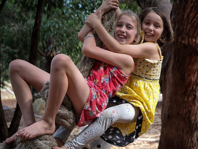 26/04/2018Sisters Lillian (8,yellow), Jaylyn (10, red) and Ebony (3) and mother Christine Start enjoying the out doors at Russell Brown Adventure Park, Mosman Park.Pic Colin Murty The Australian