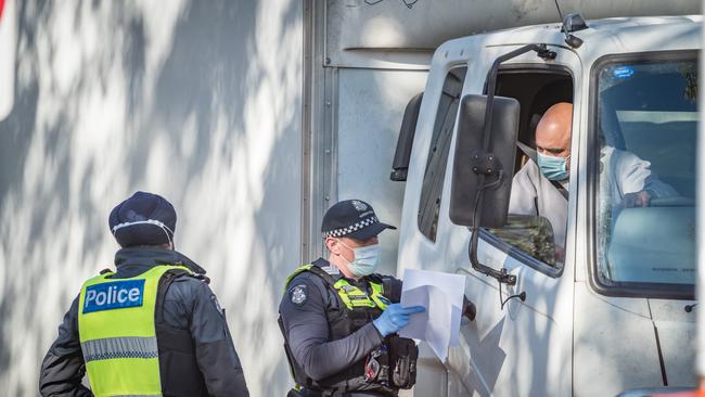 Victoria Police stopping vehicles on Sunday. Picture: Simon Dallinger