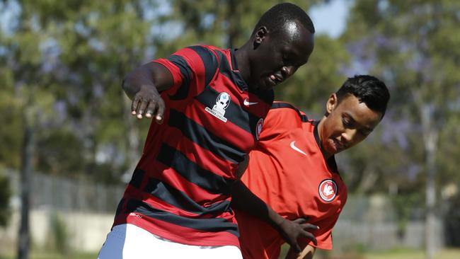 Abraham Majok (striped shirt) impressed the first team staff after good performances in the club’s NPL side.