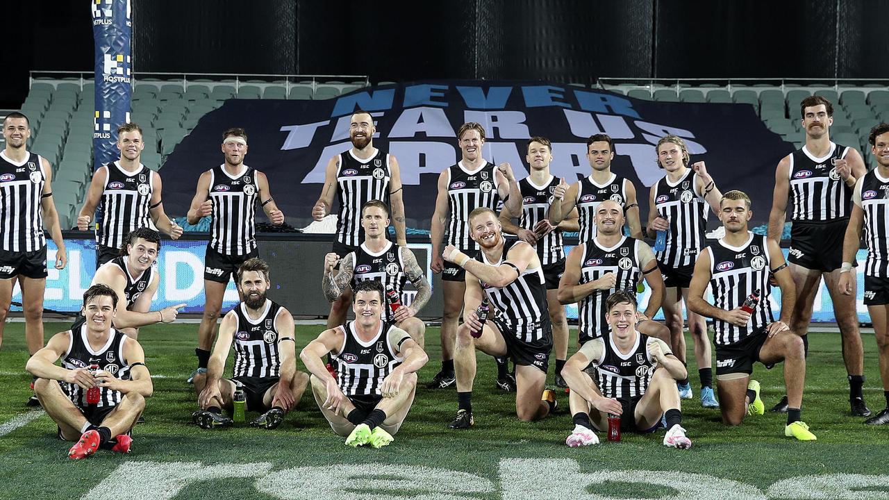 Port Adelaide rocking the prison bars jumper after winning the 2020 clash with cross-town rival Adelaide. Picture: Sarah Reed