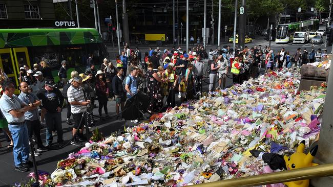 Bourke Street Memorial flowers before they were removed. Picture: Nicole Garmston