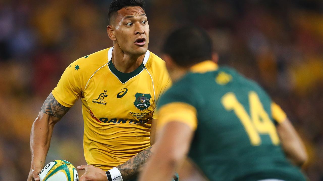 Israel Folau runs with the ball at Suncorp Stadium in Brisbane.