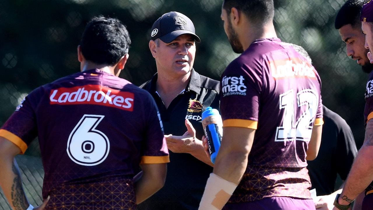 Broncos coach Anthony Seibold gives instructions to his players.