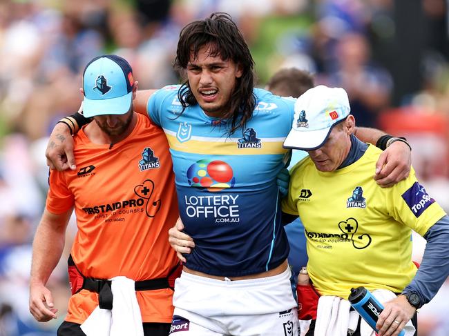 SYDNEY, AUSTRALIA - MARCH 23: Tino Fa'asuamaleaui of the Titans is helped from the field during the round three NRL match between Canterbury Bulldogs and Gold Coast Titans at Belmore Sports Ground, on March 23, 2024, in Sydney, Australia. (Photo by Brendon Thorne/Getty Images)