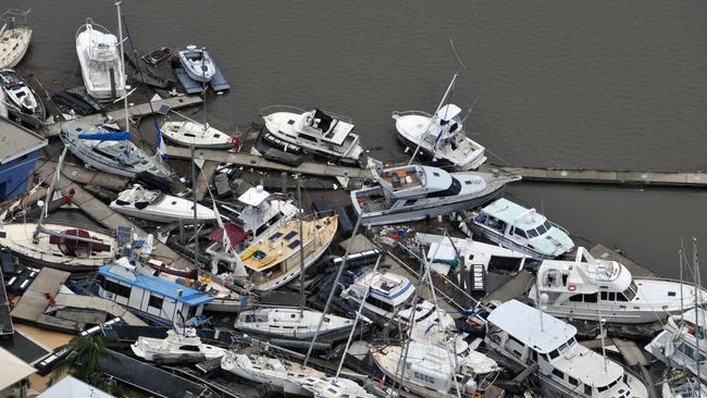 Ten year anniversary of Cyclone Yasi. Severe Tropical Cyclone Yasi 2011. Port Hinchinbrook aerial view of luxury yachts and boats that bore the brunt of the destructive winds and storm surge. Picture: Evan Morgan